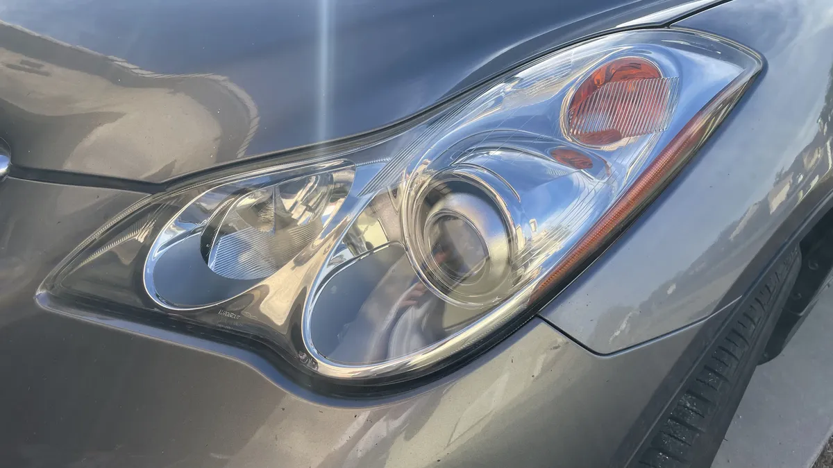 After professional headlight restoration on 2008 Infiniti EX35 (Passenger Side) in Tucson, AZ with UV protection applied.