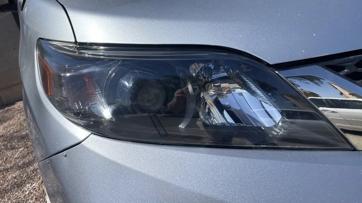 After professional headlight restoration on 2010 Lexus RX 350 in Tucson, AZ with UV protection applied.