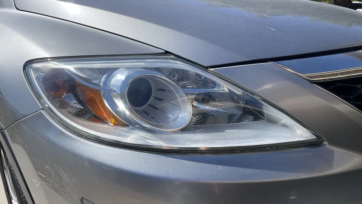 After professional headlight restoration on 2011 Mazda CX-9 in Tucson, AZ with UV protection applied.