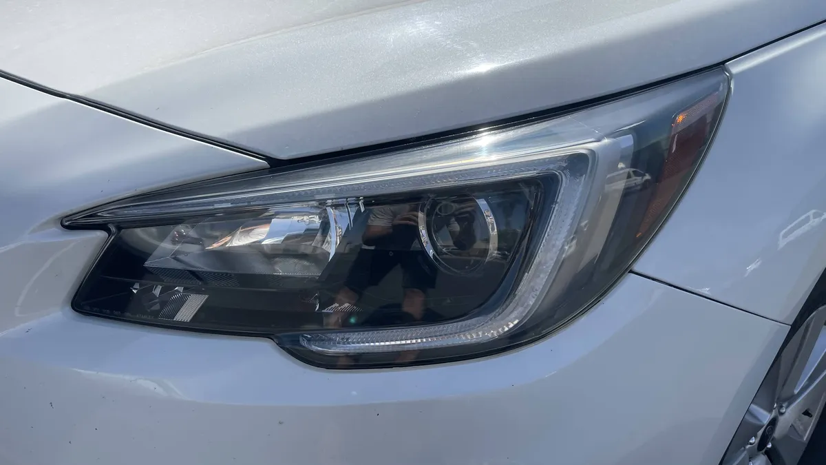 After professional headlight restoration on 2016 Subaru Outback in Tucson, AZ with UV protection applied.