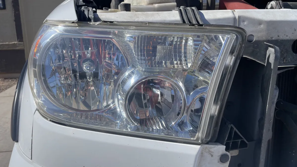 After professional headlight restoration on 2003 Toyota Tundra in Tucson, AZ with UV protection applied.